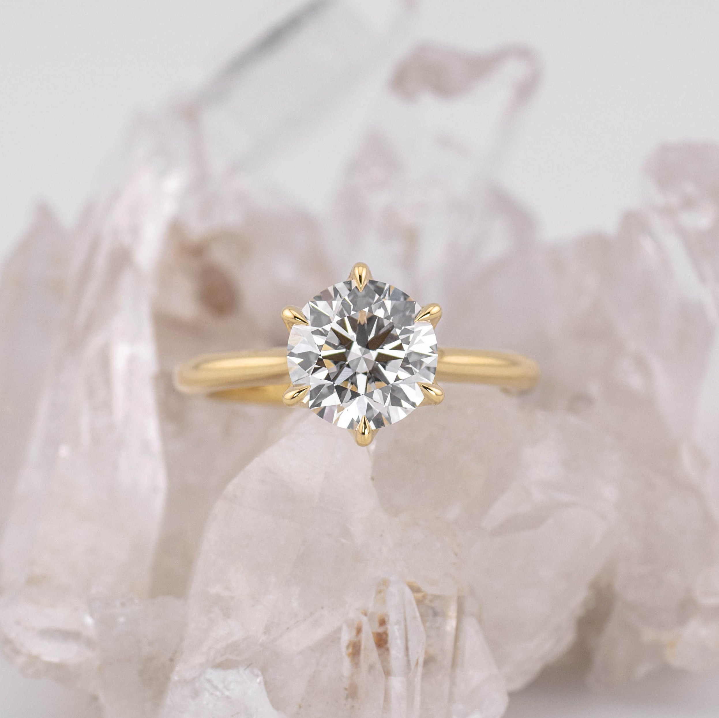 2ct Round Brilliant Cut Cathedral 6 Petal Claw Solitaire