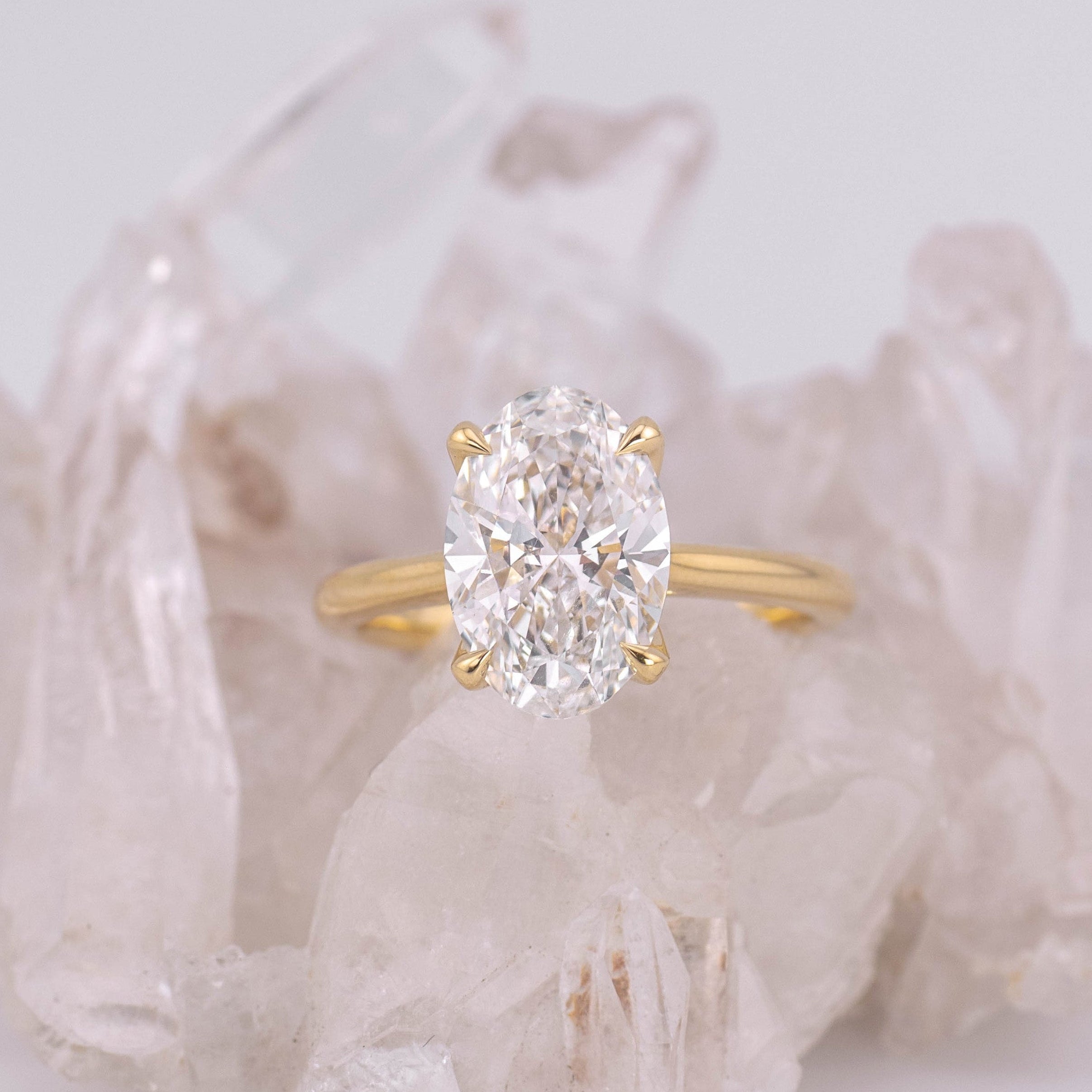 Oval Petal 3.5 – 4 Claw Petal Basket 3.5ct D/E VVS2 Oval Solitaire in 18k Yellow Gold