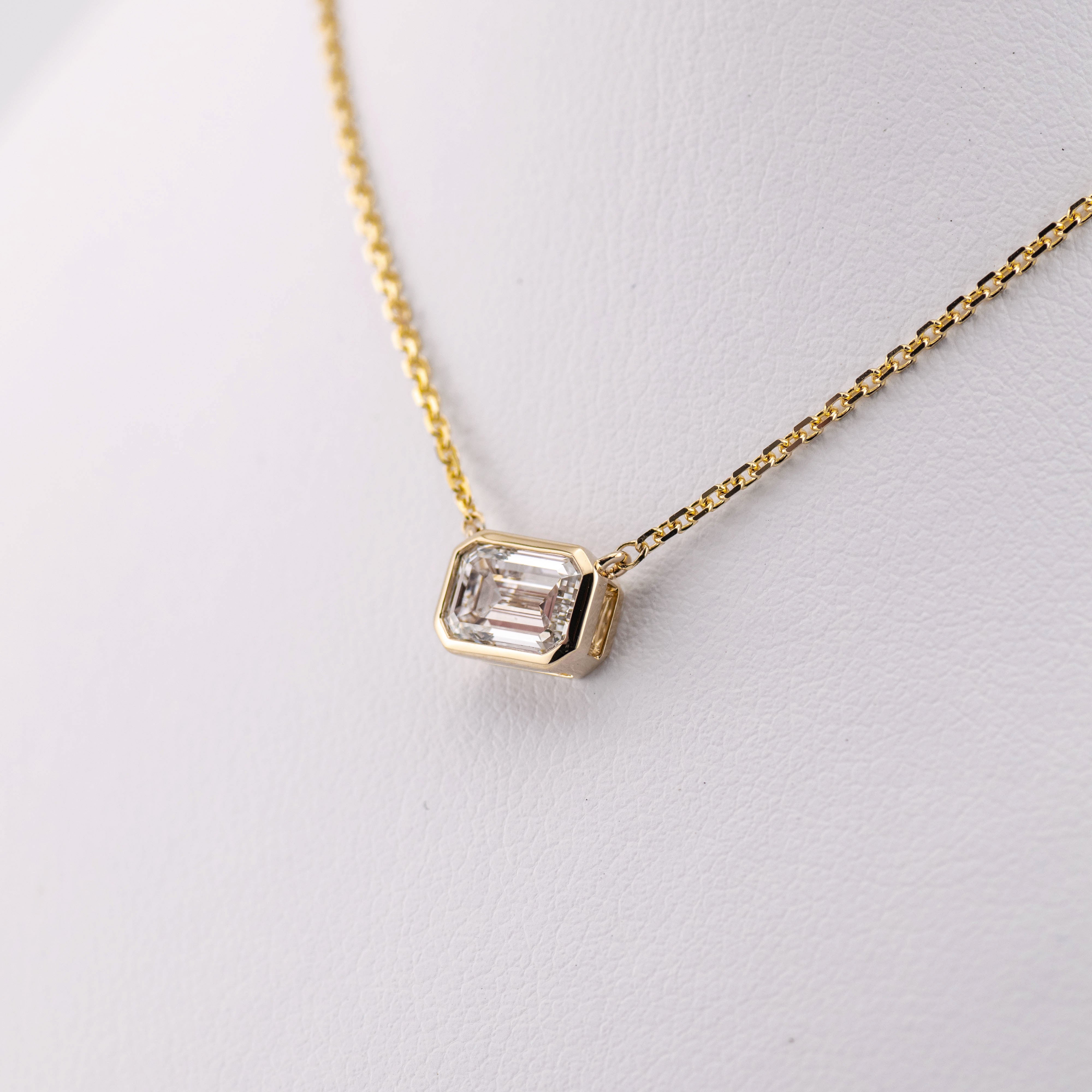 1.04ct Emerald Cut Bezel Pendant and Chain