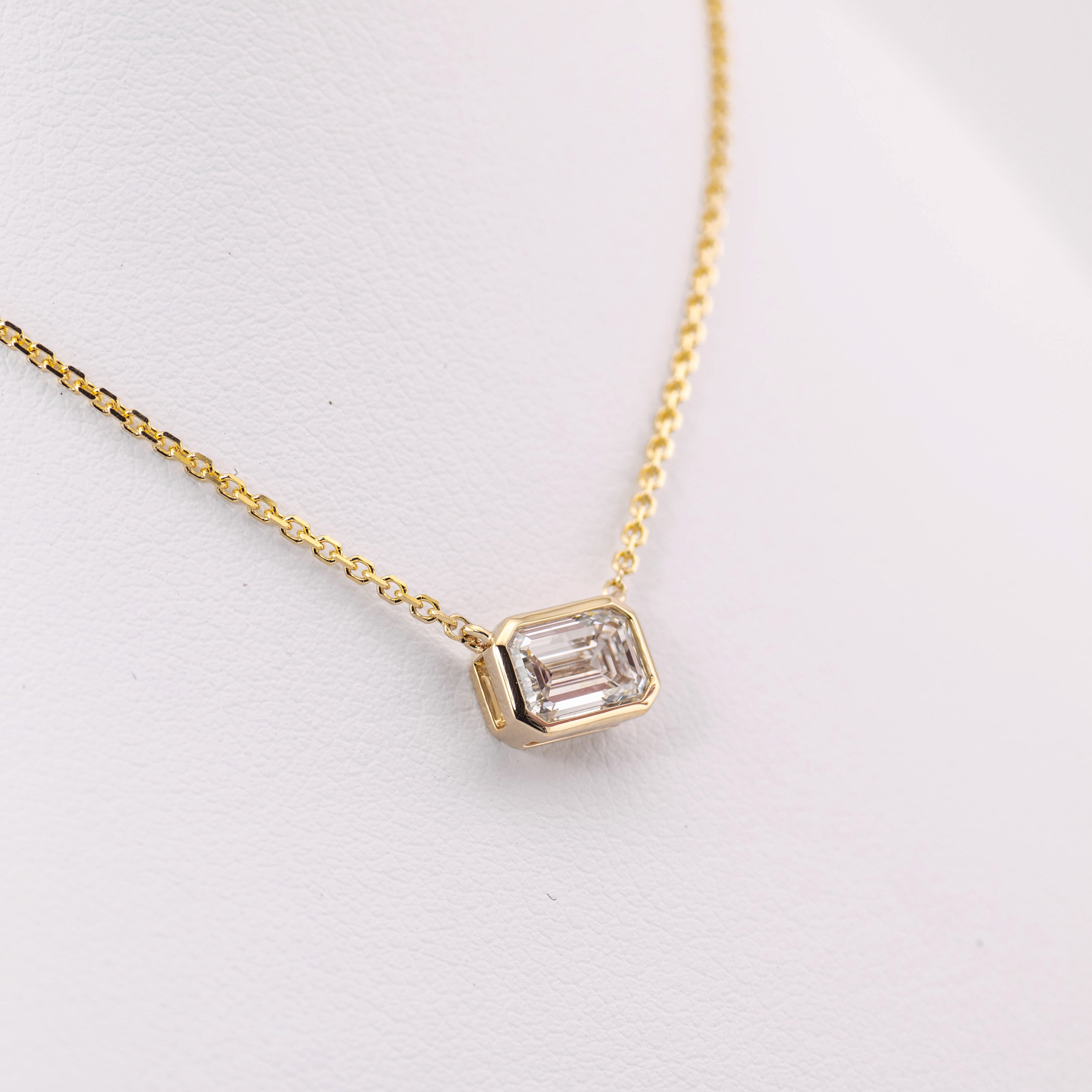 1.04ct Emerald Cut Bezel Pendant and Chain