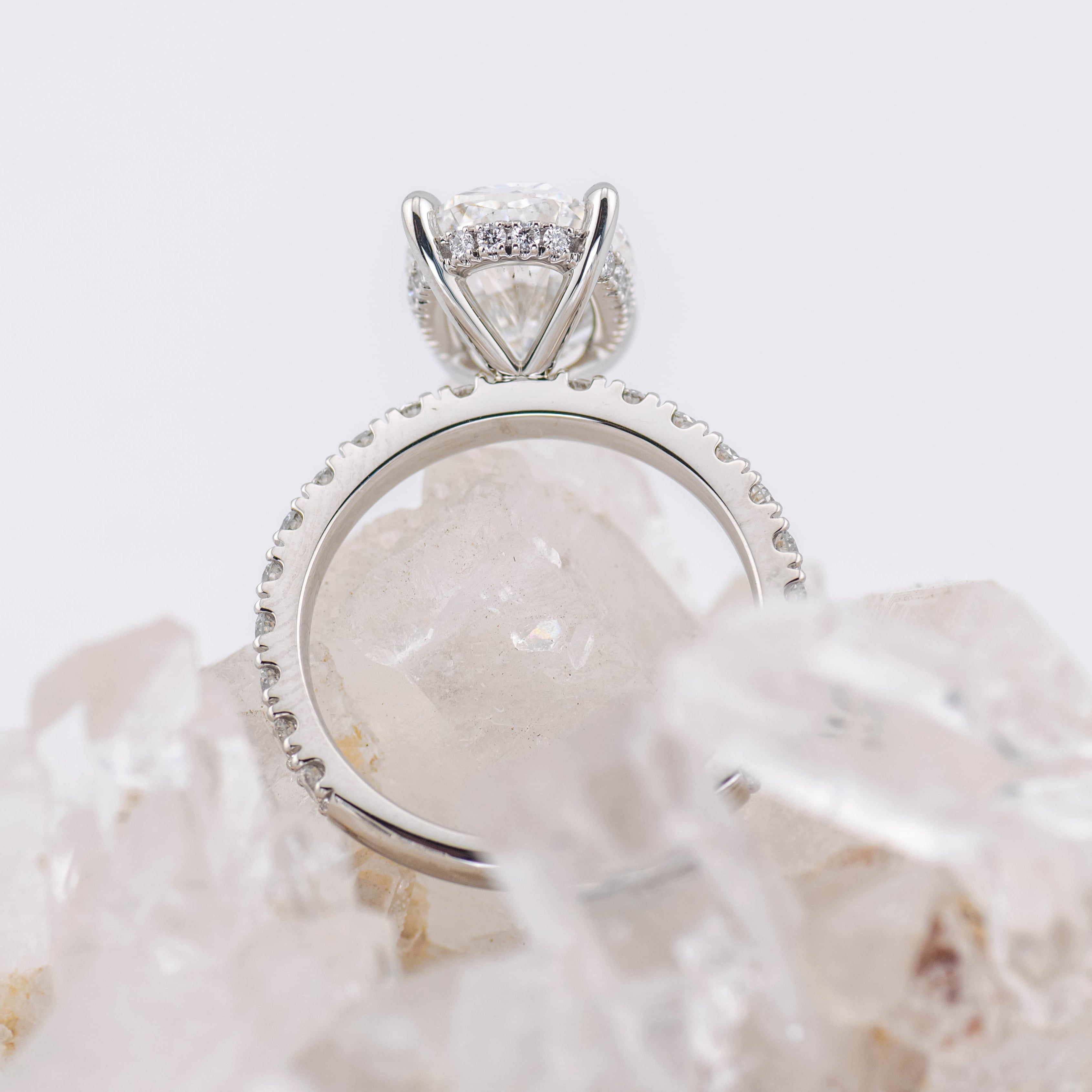 Custom Oval Solitaire with Hidden Halo and Pave Band